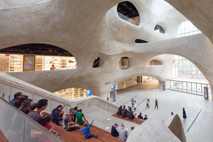 Explore stunning architecture while discovering incredible exhibitions at the American Museum of Natural History. Engage with interactive displays and immerse yourself in ancient wonders and cosmic marvels.